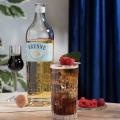 imagen cóctel con botella Brenne Highball Cassis
